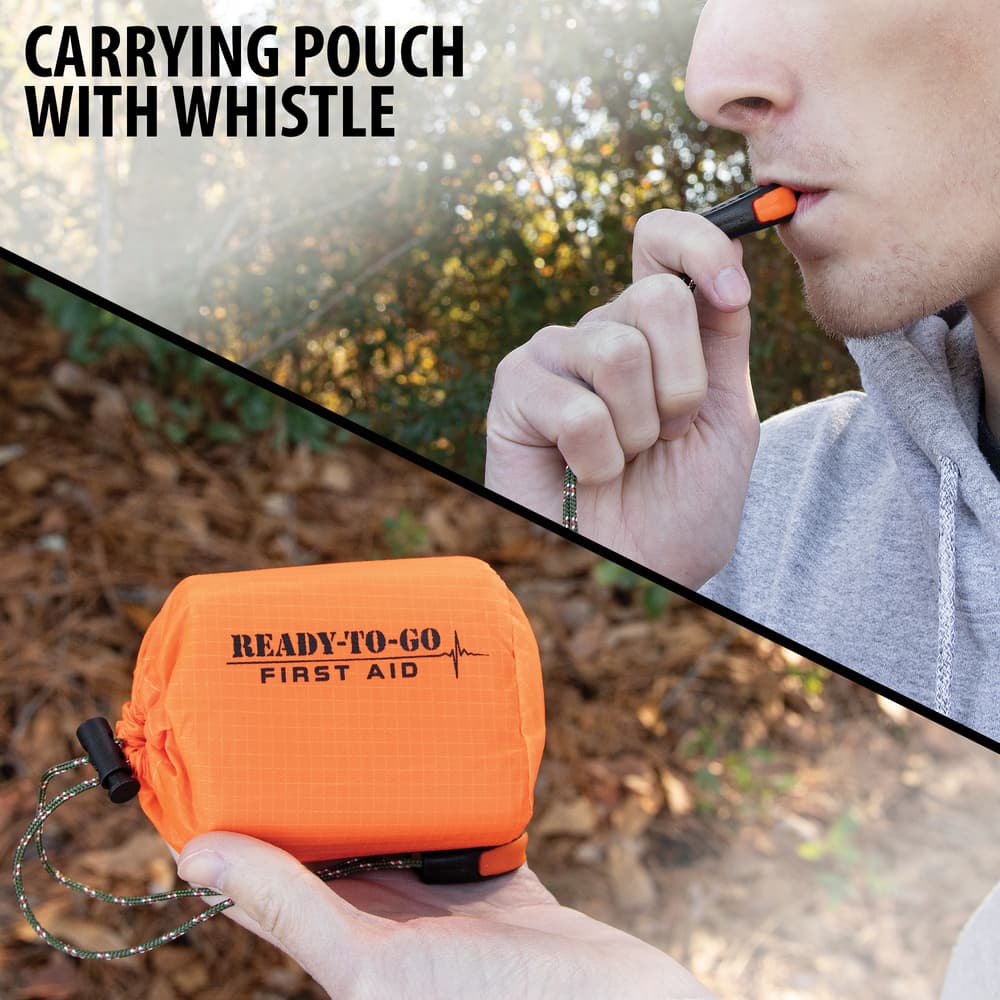 Full image showing the carrying pouch and whistle that comes with the Silver Emergency Sleeping Bag. image number 1
